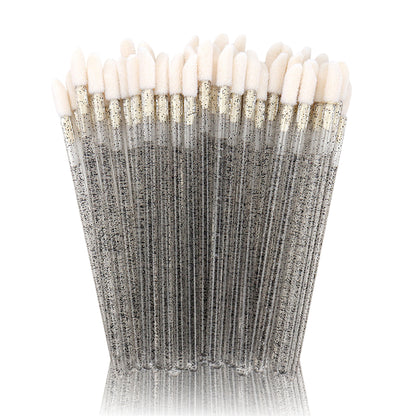 Disposable lip brush with crystal handle